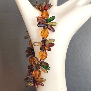 Orange beaded bracelet with spiky bead accents